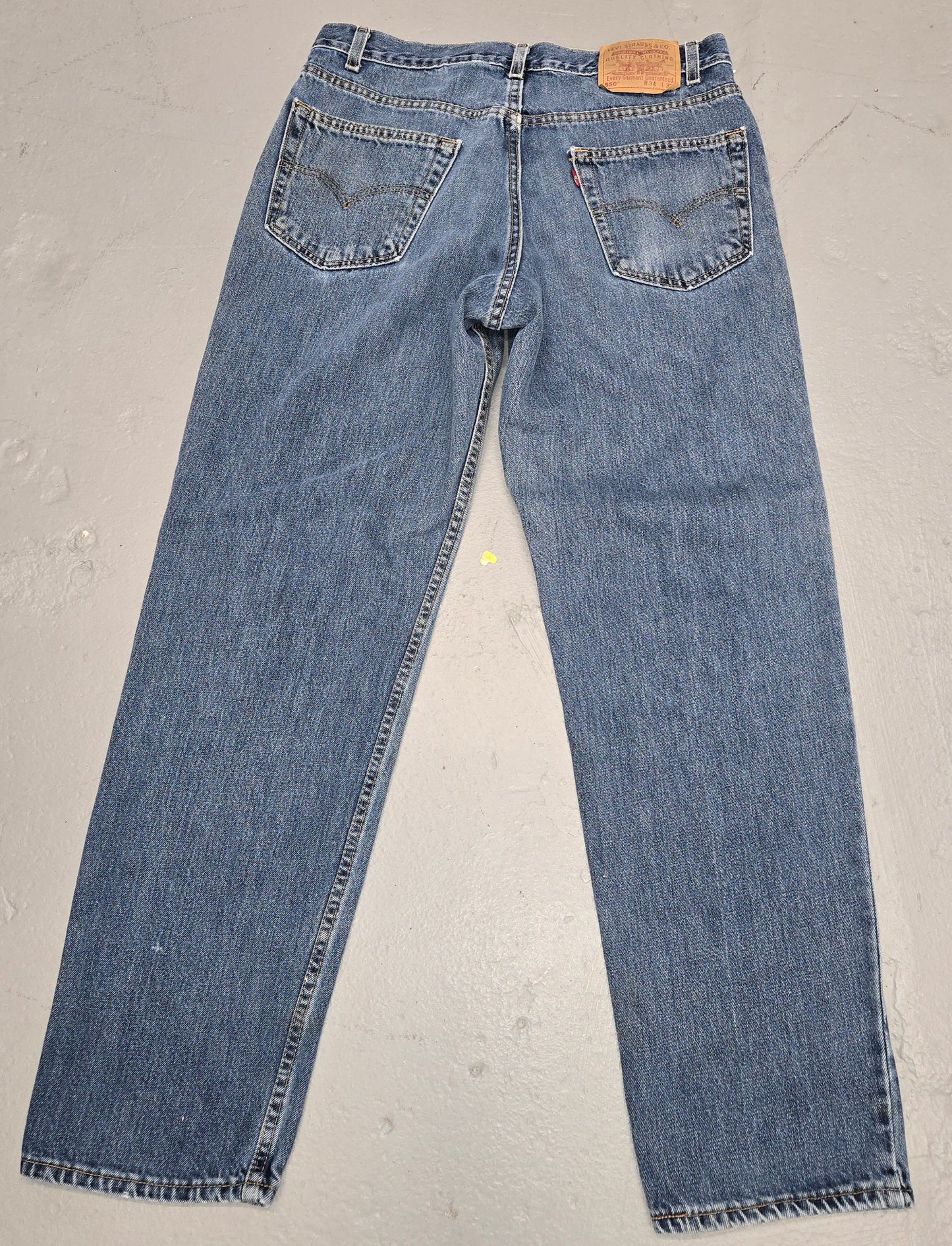 Vintage 1990s Levis 550 Distressed tab jeans 34x32 made in usa