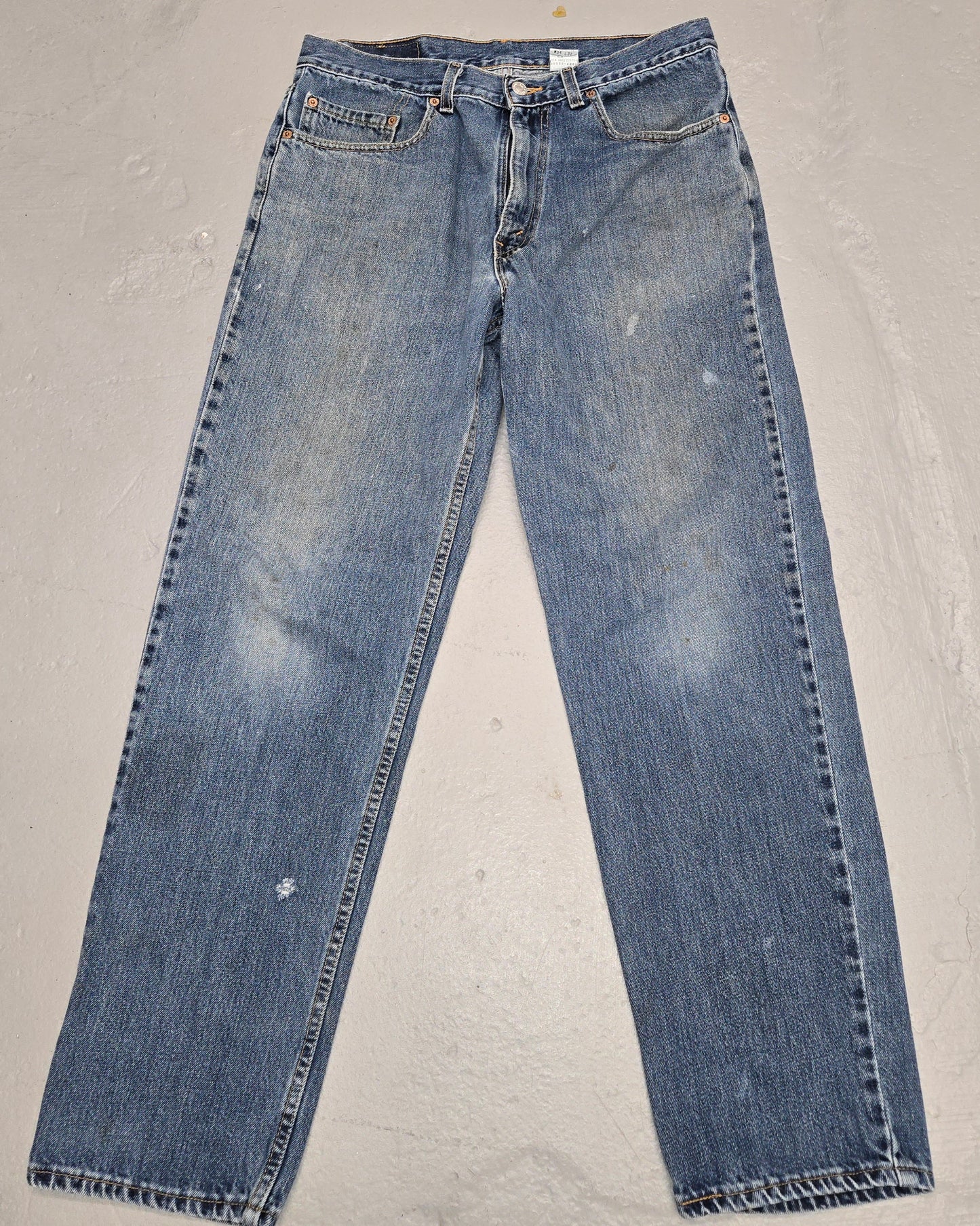 Vintage 1990s Levis 550 Distressed tab jeans 34x32 made in usa