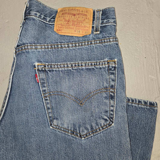 Vintage 1990s Levis 550 Distressed tab jeans 34x32 made in usa